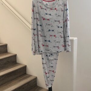 NWOT Secret Treasures Pajama Set in Gray with Red and Blue Dogs.
